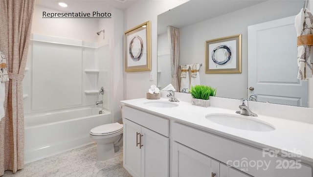 full bathroom with bathtub / shower combination, toilet, vanity, and tile patterned flooring