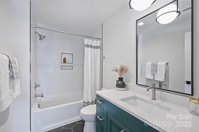 full bathroom with toilet, tile patterned floors, shower / bath combo, and vanity