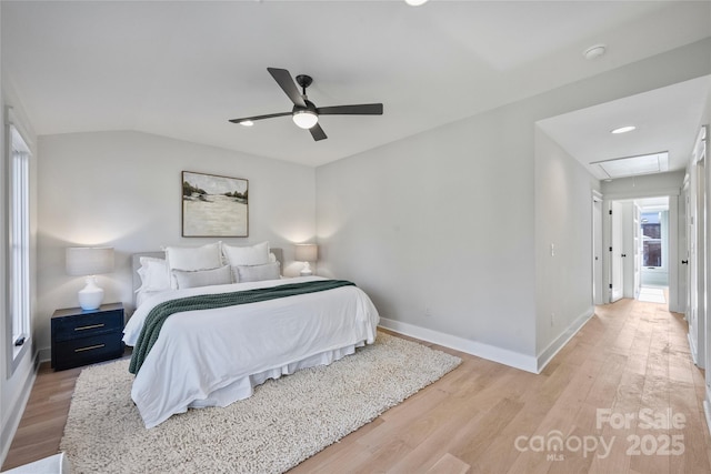 bedroom with ceiling fan and wood-type flooring