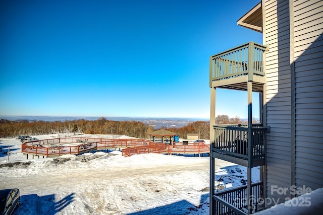 exterior space featuring a wooden deck