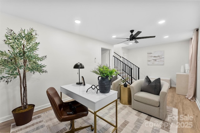 office area featuring ceiling fan and light hardwood / wood-style flooring