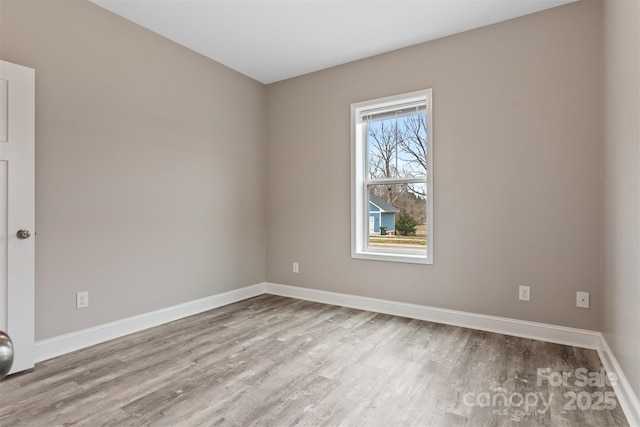 empty room featuring light hardwood / wood-style floors