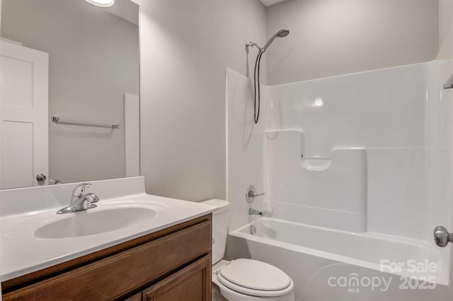 full bathroom featuring vanity, toilet, and bathtub / shower combination