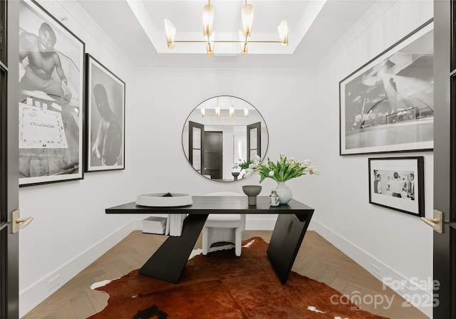 office with parquet flooring, a notable chandelier, and ornamental molding