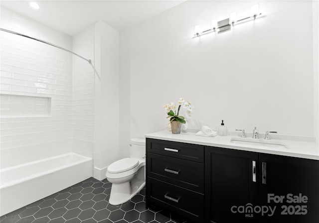 full bathroom featuring tub / shower combination, tile patterned floors, vanity, and toilet