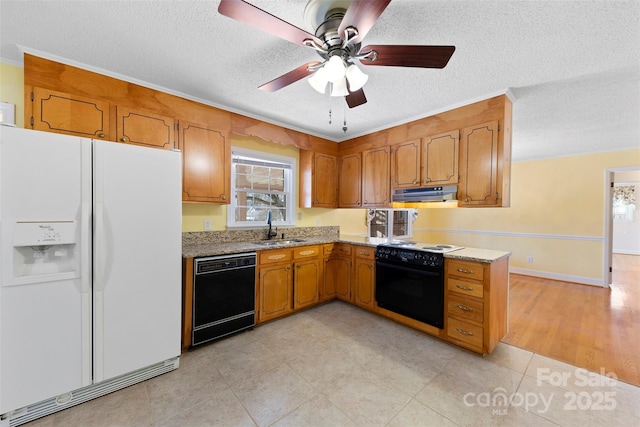 kitchen with black appliances, ceiling fan, sink, and a textured ceiling