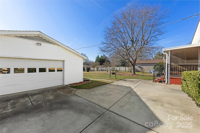 garage with a yard