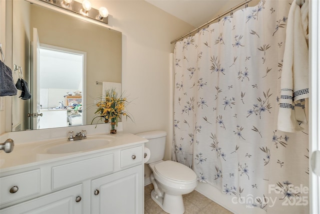 bathroom with toilet and vanity