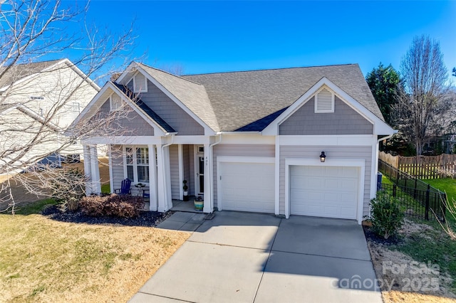 view of front of house featuring a front yard and a garage