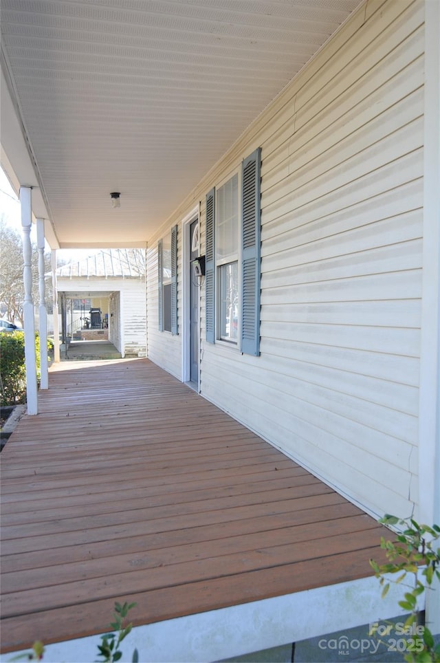 wooden deck with covered porch