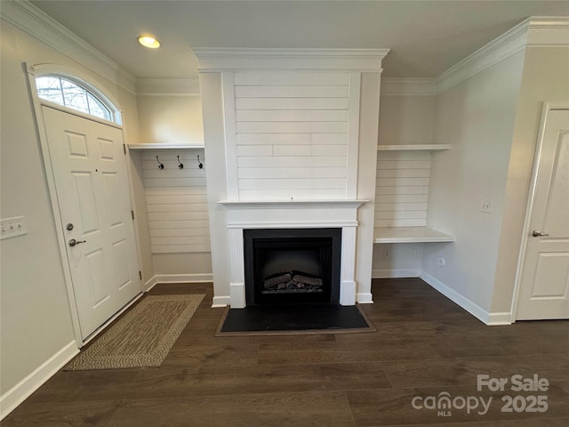 mudroom with dark hardwood / wood-style floors and ornamental molding