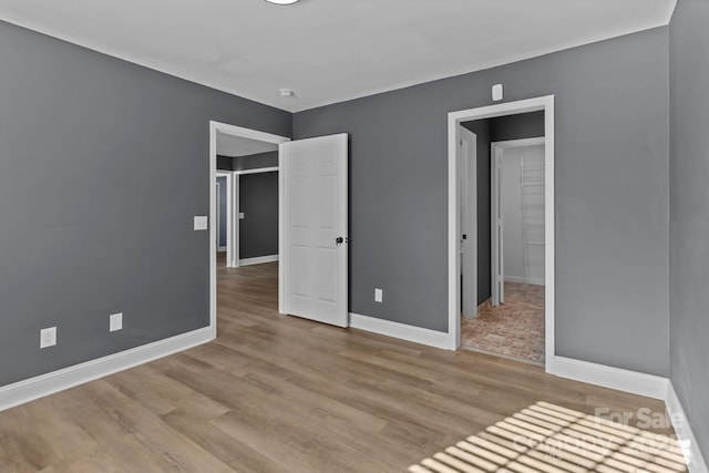 unfurnished bedroom featuring light hardwood / wood-style flooring