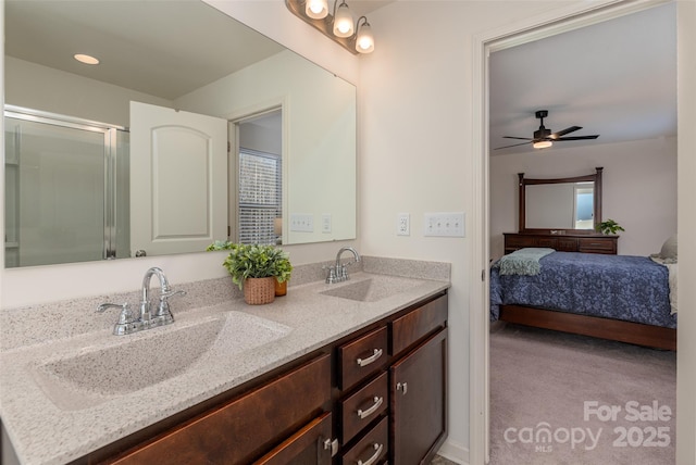 bathroom featuring vanity and ceiling fan