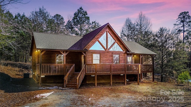 view of front of home with a deck