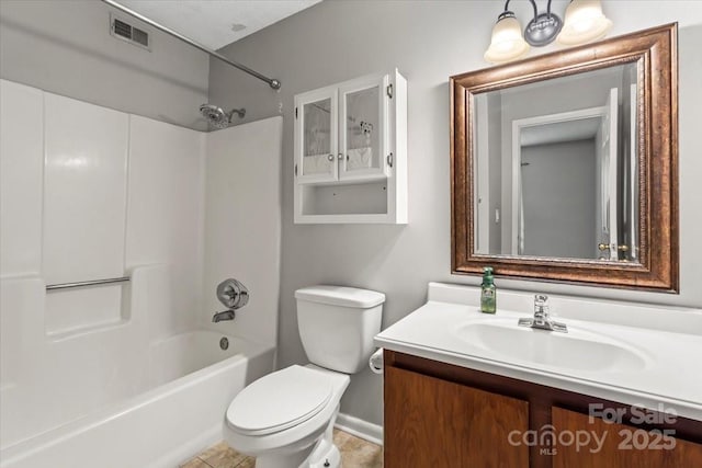 full bathroom featuring toilet, vanity, and bathing tub / shower combination