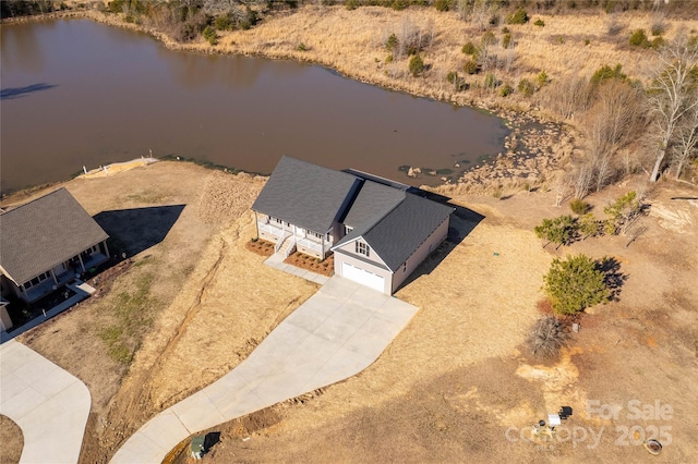 drone / aerial view featuring a water view