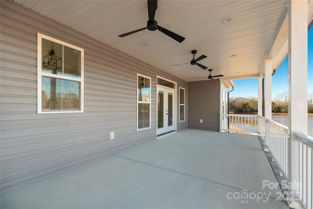 view of patio featuring ceiling fan