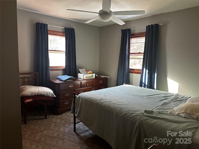 carpeted bedroom with ceiling fan