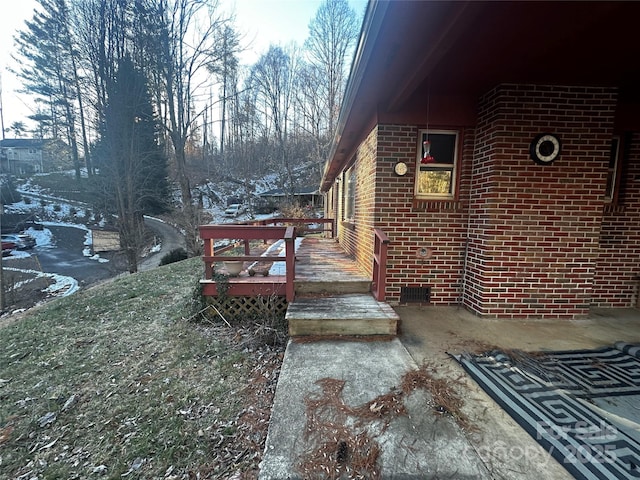 view of yard featuring a wooden deck