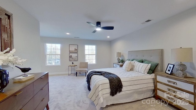 bedroom with light carpet and ceiling fan