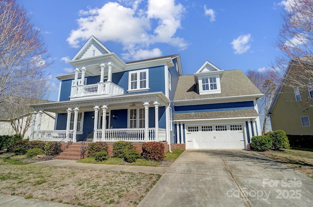 view of front of home with driveway, a porch, and roof with shingles