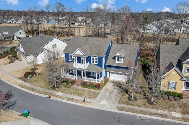 drone / aerial view with a residential view