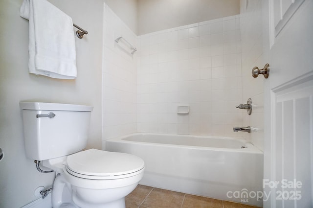 full bath with toilet, shower / bath combination, and tile patterned flooring