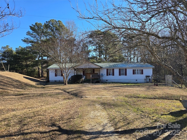 view of front of home with a front yard