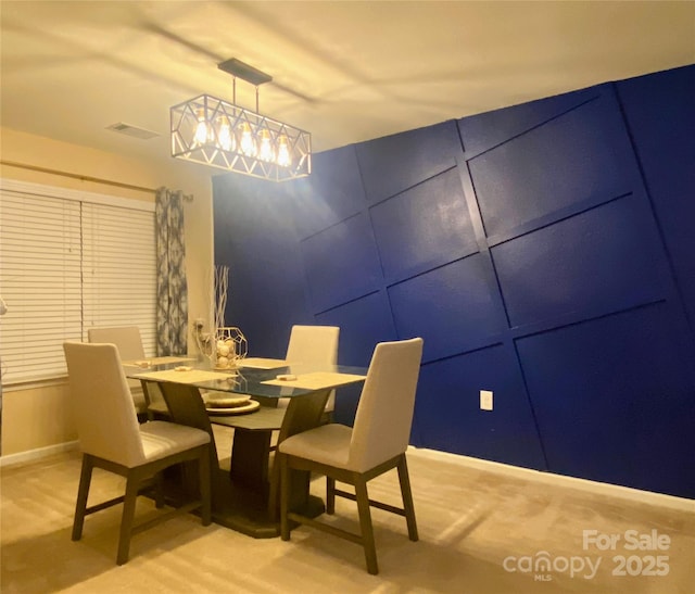 view of carpeted dining room