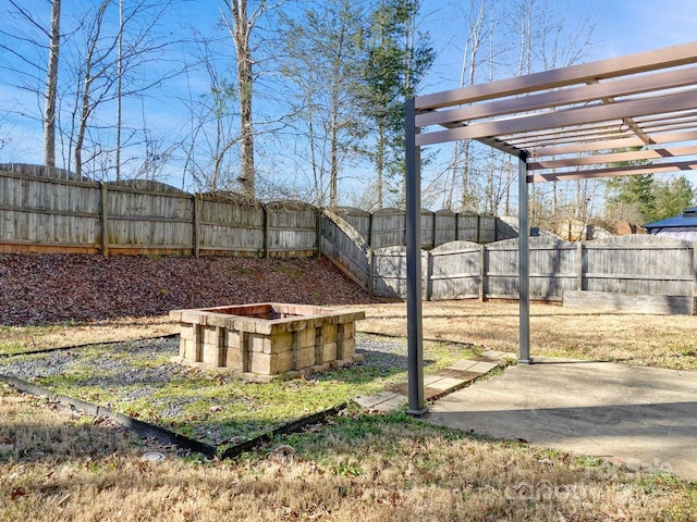 view of yard with a pergola and a patio