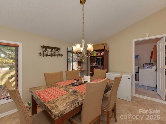 carpeted dining area with vaulted ceiling and a notable chandelier