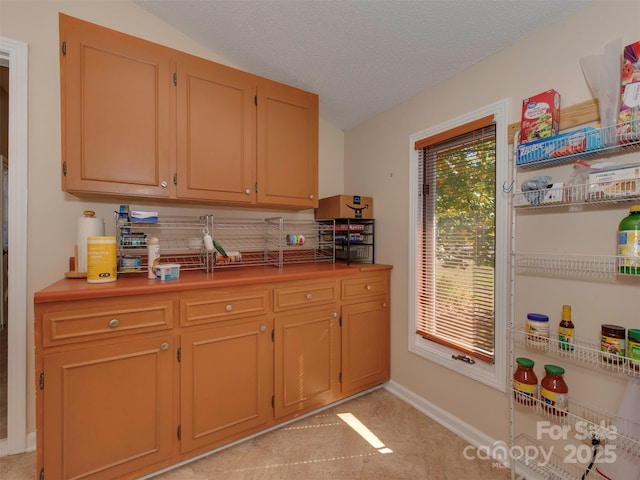 kitchen featuring a textured ceiling