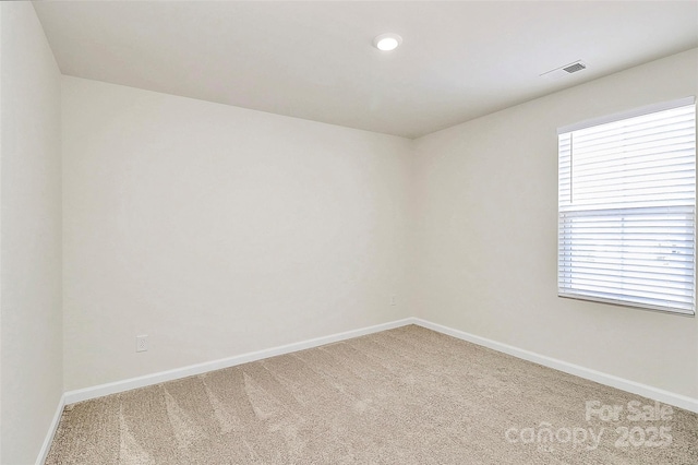 view of carpeted spare room