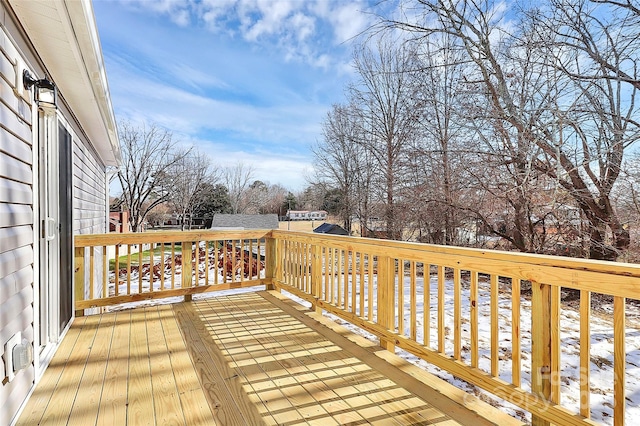 view of snow covered deck