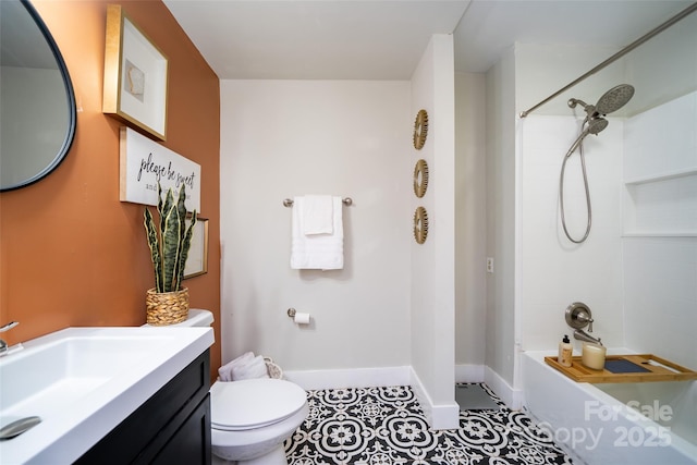 full bathroom featuring toilet, vanity, tiled shower / bath, and tile patterned flooring