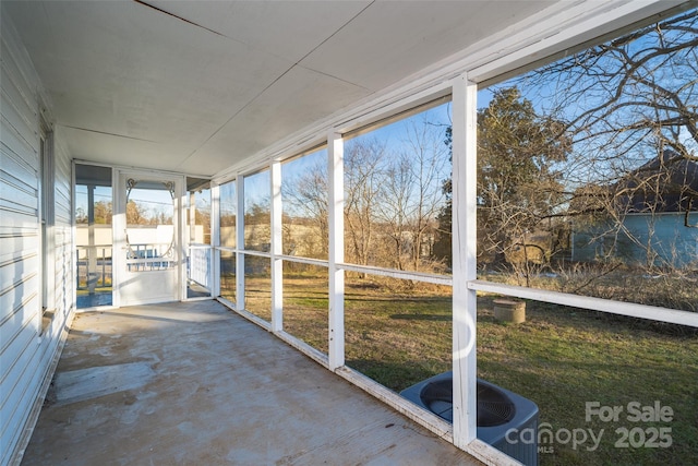 unfurnished sunroom featuring a wealth of natural light