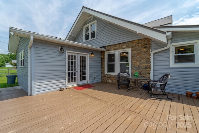 wooden terrace featuring french doors