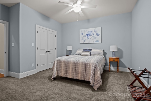 bedroom featuring ceiling fan, carpet, and a closet