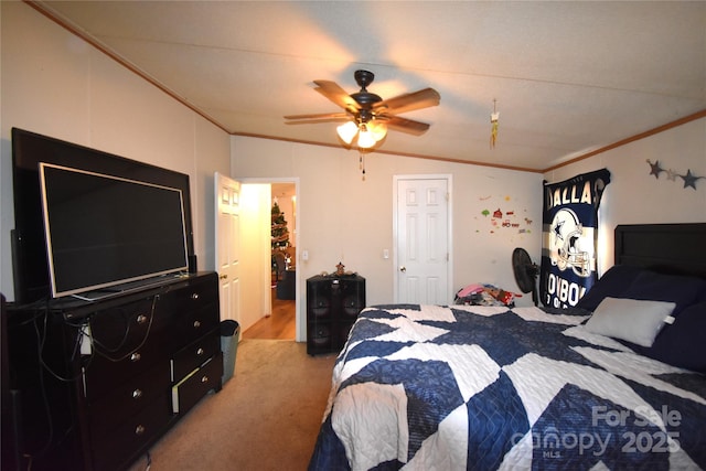 bedroom with ceiling fan and ornamental molding