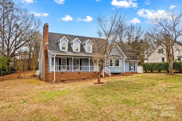 cape cod-style house with a porch and a front lawn