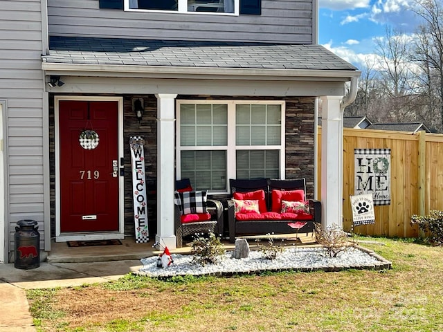 doorway to property featuring a yard