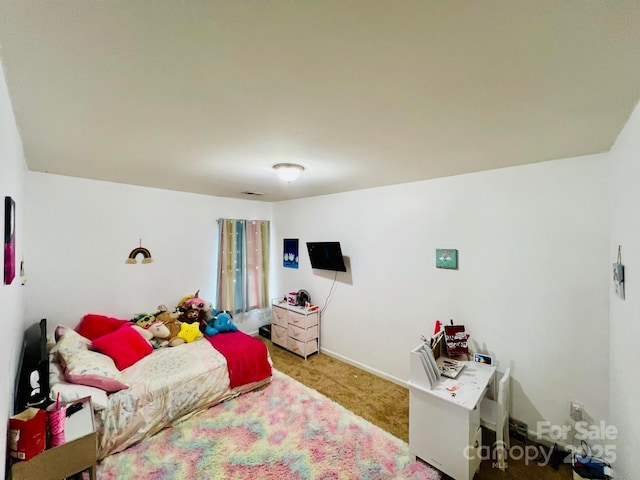 bedroom featuring carpet flooring