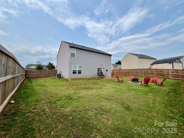 719 Dottie Dr, Boiling Springs, SC 29316 - back of house with central air condition unit and a fire pit