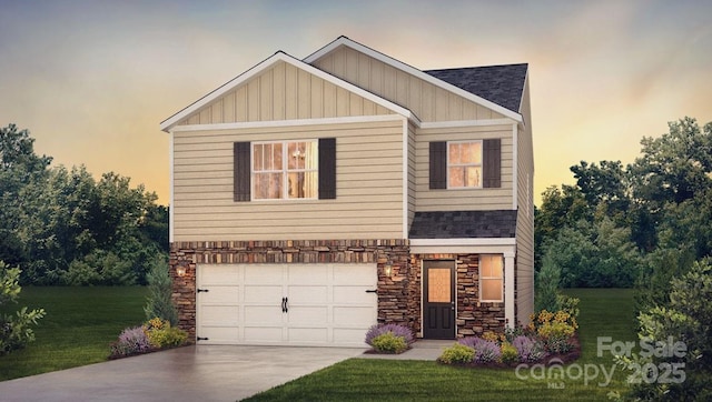 craftsman house featuring a garage and a lawn