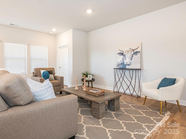 living room with hardwood / wood-style flooring