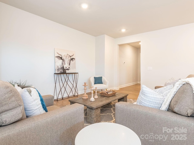 living room with light hardwood / wood-style flooring