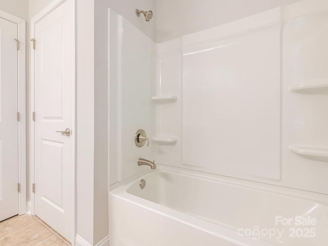 bathroom featuring shower / bath combination and tile patterned floors