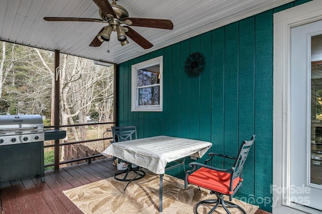 sunroom / solarium with ceiling fan