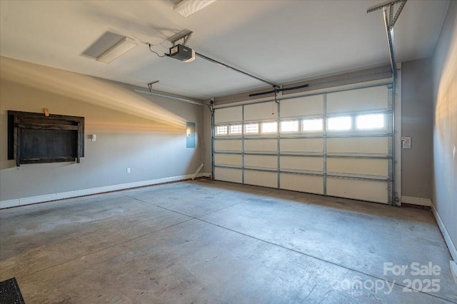 garage featuring a garage door opener