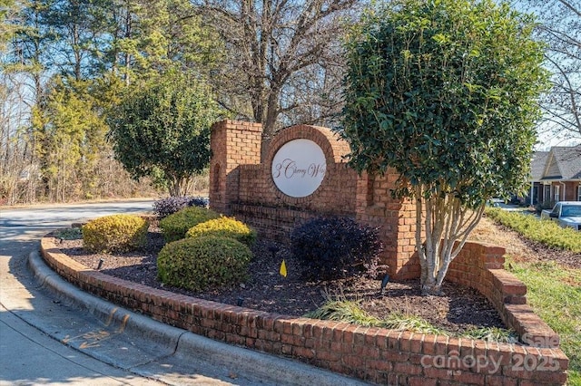 view of community sign